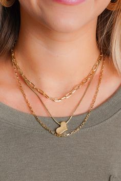 Spread the love with our Valentina Layered Necklace. This unique piece features a small square chain, a gold link chain with a heart pendant, and a paper clip chain, all in one necklace! With a length of 18 inches, it's the perfect statement piece for any outfit. It is lea and nickel compliant and is light weight Trendy Heart Shaped Necklace With Gold Chain, Trendy Heart-shaped Gold Chain Necklace, Trendy Chain Necklace With Heart Charm For Everyday, Trendy Everyday Chain Necklace With Heart Charm, Everyday Heart Necklace With Chain For Valentine's Day, Valentine's Day Heart Necklace With Chain For Everyday, Trendy Heart-shaped Everyday Chain Necklace, Trendy Gold Heart Pendant Chain Necklace, Everyday Heart Pendant Necklace With Gold Chain