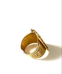 Step your ring candy game all the way up Queen! Adjustable Brass Beautiful carved ring oozes Afrohemian glam! A true statement ring for unabashed style. Luxury Modernist Yellow Gold Signet Ring, Luxury Hand Cast Engraved Open Ring, Carved Gold Ring Jewelry, Artisan Carved Adjustable Ring, Unique Carved Adjustable Rings, Unique Carved Ring Jewelry, Unique Adjustable Open Signet Ring, Unique Carved Promise Ring, Bohemian Carved Ring Jewelry