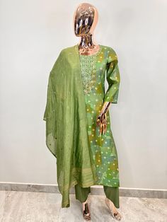 Green Embroidered Silk Straight Kurta with Trousers & Dupatta For Party /Festive / Wedding For Women Pakistani Salwar Kameez / Indian Wedding Dress / Plus Size Cotton Dress Traditional Indian Wear / Salwar Kameez Dupatta / Kurti Palazzo Set The set contains: 1 Kurta 1 Trousers 1 Dupatta Kurta: The green Embroidered Silk straight Kurta has a round neck design with mirror work details. The Kurta measures calf length and has straight hemline. It comes with 1 pocket.  Sleeve length :  3/4 Sleeves Pa Semi-stitched Green Kurta With Sheer Dupatta, Pakistan Salwar, Semi-stitched Green Salwar Kameez With Cutdana, Semi-stitched Green Naqshi Dupatta, Semi-stitched Pista Green Floor-length Salwar Kameez, Bohemian Green Semi-stitched Salwar Kameez, Mehendi Party, Kurti Palazzo Set, Party Wear For Women