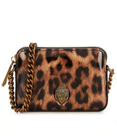 From Kurt Geiger London&#x2C; the Kensington Micro Animal Print Camera Crossbody Bag features:100% synthetic exteriorBronze hardware100% Polyester liningExterior zipper closureSingle interior compartment&#x2C; front pocket with magnet snap closureAdjustable single strapApprox. 4.72''W x 3.14''H x .8''D; 23.22'' strap dropImported. London Kensington, Kensington London, Bronze Hardware, Cute Purses, Kurt Geiger, Dillard's, Cross Body Handbags, Front Pocket, Fashion Statement