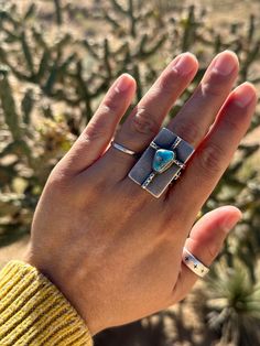 Artisan Handmade Natural Morenci Turquoise and Sterling Silver Artisian Designed Cross Shield Style Ring USA Boho Southwestern Jewelry. This Statement Artisian handmade Shield Style ring is truly unique and one of a kind! Contemporary style meets artistic design with a gorgeous Natural Morenci Turquoise stone set within the hand forged cross design. The vivid blues in this stone are incredible. In the New Mexico desert the Cholla Cactus is currently blooming with native fuscia flowers that are s Fuscia Flowers, Forged Cross, New Mexico Desert, Mexico Desert, Cholla Cactus, Morenci Turquoise, Southwestern Jewelry, Cross Design, Cross Designs