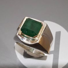 Watch video here: https://youtu.be/oy8TZ2IHB1o Natural Unheated Untreated beautiful Swat Rich green dark Emerald Rich Green Beautiful Color Stone weight : 7.30 Carats Stone shape is emerald cut Stone has natural inclusions but not broken Highest Quality Emerald Premium 925 Sterling Silver Ring size 10 US Resize able as per buyer choice Premium Quality Engagement Ring Anniversary Ring Shipping option is FedEx Three working days Handling Time Lowest Price ever for this kind of Big emerald. Contact Gia Certified Green Sapphire Ring For Formal Occasions, Formal Gia Certified Green Sapphire Ring, Formal Green Sapphire Ring With Vvs Clarity, Fine Jewelry Green Sapphire Ring With Prong Setting, Modern Emerald Cut May Birthstone Jewelry, Modern Green Diamond Ring For Formal Occasions, Elegant Green Emerald Cut Signet Ring, Modern Emerald-cut Green Diamond Ring, Gia Certified Green Oval Sapphire Ring