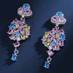 White Gold Plated Blue, Pink Topaz And Citrine Zircon Drop Earrings. Dainty, Delicate And Elegant. Other Listings Include Necklace, Rings, Cuff, Bangle, Bracelets, Platinum, Sterling Silver, Gold, Unique, Beaded, Large, Big, Happy, Imperial, Smile, Chunky, Zodiac, Nameplate, Gen Z, Pastel, Chain, Cube, Stainless Steel, Smile, S Diamonds, Cubic Zirconia, Aquamarine, Emerald Rings, Sapphire, Ruby, Boho, Bohemian, Fashion, Handmade, Gem, Gemstones, Accessories, Fashionista, Crystals, Bling, Envywea Elegant Multicolor Cubic Zirconia Crystal Earrings, Wedding Crystal Earrings With Cubic Zirconia Gemstone, Multicolor Crystal Earrings For Wedding, Topaz And Citrine, David Yurman Earrings, Rings Sapphire, Cottagecore Jewelry, Necklace Rings, Pink Stud Earrings