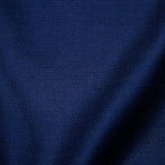 a close up view of a blue fabric