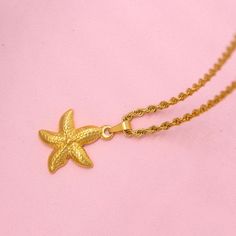 Shine Bright with the Gold Starfish Charm Necklace Are you a passionate lover of the sea and all its wonders? Then our Gold Starfish Charm Necklace is the perfect accessory to showcase your adoration for the deep blue. This exquisite necklace is carefully crafted to capture the essence of the sea, making it a must-have for any sea enthusiast. As part of our Starfish Necklace Collection, the Gold Starfish Charm Necklace is a timeless piece that will instantly elevate your style. Its intricate des Gold Starfish Clavicle Chain Necklace, Ocean-inspired Necklaces With Star Charm, Elegant Starfish Necklace For Gift, Ocean-inspired Star Necklaces For Gifts, Ocean-inspired Jewelry With Star Charm, Ocean-inspired Jewelry With Starfish Charm As Gift, Ocean-inspired Jewelry With Starfish Charm For Gift, Ocean-inspired Jewelry With Star Charm As Gift, Ocean-inspired Star Charm Jewelry Gift