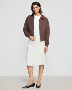 In a rich hue and with chic seam detailing, this classic bomber jacket is the cherry-on-top of any fall look. Cut from a luxe, medium-weight cotton twill, Lev is the perfect addition to your seasonal transition wardrobe. See below for our general Size Guide and available measurements Made of 100% cotton Machine wash cold and lay flat to dry Classic Spring Outerwear With Zip Cuffs, Fall Cotton Outerwear With Zip Cuffs, Fall Workwear Cropped Jacket With Ribbed Cuffs, Chic Fall Outerwear With Zip Cuffs, Chic Outerwear For Work With Ribbed Cuffs, Cotton Outerwear With Ribbed Cuffs, Chic Cotton Outerwear For Layering, Chic Cotton Outerwear, Chic Cotton Cropped Jacket For Fall