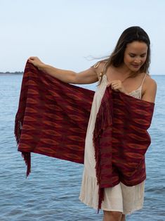 "Luxury shawl made in macana, an artisan fabric handmade in Ecuador (Ikat technique). 100% cotton - 70% organic pigments. The \"Macana\" is an artisan fabric handmade on waist looms with organic cotton. The ancestral technique called \"Ikat\" has been transmitted for generations in the Andes of southern Ecuador. The tints used to dye the fabrics are of natural origin (plants, fruits and vegetables). Yakina wants to revalue and perpetuate this centuries-old tradition, thanks to fair trade with the network of artisans from the Gualaceo region (Ecuador)." Ikat Technique, Luxury Shawl, Red Clay, Ethnic Style, Ethnic Fashion, Handmade Accessories, Fruits And Vegetables, Ecuador, Fair Trade