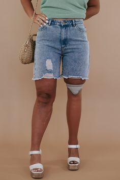 REAL shorts, for REAL bodies. Give your closet a stylish boost with a practical charm. Our Distressed Denim Shorts create an easygoing look that goes with any top, perfect for dressing up or going casual! Your go-to denim short as we take on summer! Distressed denim shorts Jean shorts Spring denim shorts Frayed bottoms Functional pockets Minimal distressing Button + Zip closure High Waisted 65% cotton, 35% polyester Imported Model Specs: Karli + Emily are wearing a size small in the photo.How will this item fit you? Check out our MODEL SPECS (Typical Sizing - Karli: S-Size 5/26 - 5ft 2in, Emily: S-Size 3/25 - 5ft 5in, Syd: L/XL- Size 15/ - 5ft 8in) Measurements: S Waist 28" Inseam 5 1/2" Rise 11" M Waist 30" Inseam 5 1/2" Rise 11 1/4" L Waist 32" Inseam 5 3/4" Rise 11 1/2" Need help with s Trendy Knee-length Jean Shorts For Spring, Denim Bermuda Shorts For Summer, Relaxed Fit Cutoff Shorts For Day Out, Trendy Relaxed Fit Knee-length Jean Shorts, Relaxed Fit Denim Shorts For Day Out, Relaxed Fit Jean Shorts For A Day Out, Trendy Relaxed Fit Bermuda Shorts For Day Out, High Rise Bermuda Shorts With Built-in Shorts, Relaxed Denim Shorts For Day Out