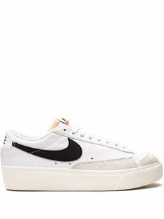 White/black leather Blazer Low Platform sneakers from NIKE featuring signature Swoosh logo detail, logo print to the rear, suede panels, round toe, front lace-up fastening, logo patch at the tongue, branded insole and rubber sole. These styles are supplied by a premium sneaker marketplace. Stocking only the most sought-after footwear, they source and curate some of the most hard to find sneakers from around the world.. Nike Blazer Low, Blazer Low, Miu Miu Shoes, Swoosh Logo, Nike Blazer, Black Sneakers, Leather Blazer, Nike Cortez Sneaker, Ballet Flat Shoes