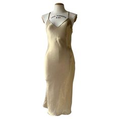 Check out this item from 1stdibs! Gold Christian Dior by John Galliano 2002 dress: https://www.1stdibs.com/id-v_22701512 1stdibs John Galliano, Dior Slip Dress, Vintage Dior Dress, Dior By John Galliano, Dior Dress, John Galliano, Gold Dress, Vintage Dior, Day Dresses