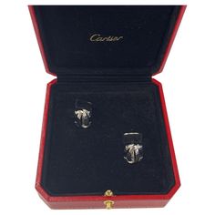 Elevate your formal attire with these luxurious men's cufflinks from Cartier, 24518A featuring a sophisticated Penelope logo in 18ct white gold. Crafted with meticulous attention to detail, these cufflinks embody the perfect fusion of classic elegance and modern sophistication. Total Weight: 13.27g Dimensions: 15.93mm x 12.48mm SMS9379 Luxury White Gold Formal Earrings, Luxury White Gold Earrings For Formal Occasions, Luxury Cartier Formal Earrings, Luxury Engraved Cufflinks For Business, Elegant Engraved White Gold Cufflinks, Formal White Gold Earrings, Classic Cartier Earrings For Formal Occasions, Luxury White Gold Cufflinks For Wedding, Classic White Gold Cufflinks For Formal Occasions