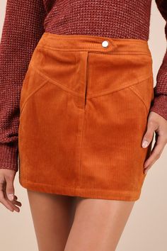 The Lulus Perfected Cuteness Rust Orange Corduroy High-Rise Mini Skirt was made to be paired with chunky sweaters and sleek knee-high boots! Soft ribbed corduroy shapes this trendy skirt that features a high, banded waist with a snap button strap and a hidden zip fly. The A-line silhouette features vintage-inspired, yoke seam detailing across the front, decorative welt pockets at the back, and a flirty mini hem. Fit: This garment fits true to size. Length: Mid-thigh. Size medium measures 15.5" f Fall High Waist Mini Skirt With Pockets, High Waist Mini Skirt With Pockets For Fall, High Waist Fitted Corduroy Mini Skirt, Chic Spring Corduroy Skirt, Trendy Corduroy Mini Skirt For Winter, Trendy Winter Corduroy Mini Skirt, High Waist Fitted Corduroy Skirt, Fitted High Waist Corduroy Skirt, Corduroy Lined Skirt Bottoms For Fall