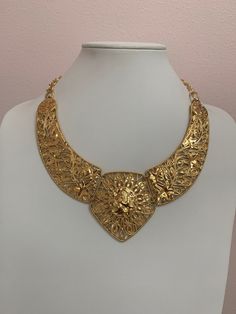 This is a unique piece of jewelry signed BARRERA for Avon (Jose Maria BARRERA), three section bib runway statement necklace! Gold tone, hinged, hook closure,  A beautiful collector's item and conversation piece. This necklace is perfect for any occasion. Necklace length: approx. 17" (adjustable) Excellent condition, like new! It comes from a private collection. PLEASE look at ALL pictures for measurements and condition as they are a very important part of the description, and what you will receive! Pictures are made with different light! Please note that this is sold "As Is", no returns please! The Link to my shop is: https://www.etsy.com/shop/MyWildWork Gold Bib Necklace Costume Jewelry, Gold Costume Jewelry Bib Necklace, Vintage Gold Bib Necklace Gift, Vintage Gold Choker With Intricate Design, Gold Vintage Bib Necklaces For Gifts, Gold Necklaces With Intricate Metal Design, Gold Jewelry With Intricate Design, Gold Metal Bib Necklace, Ornate Gold-tone Metal Jewelry