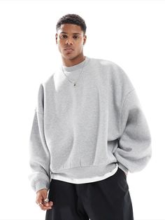 this is an oversized grey sweatshirt/jumper for men Oversized Gray Crew Neck Sweater, Gray Relaxed Fit Fleece Sweater, Oversized Heather Grey Crew Neck Sweater, Gray Drop Shoulder Sweater With Ribbed Cuffs, Casual Oversized Heather Grey Sweater, Solid Color Relaxed Fit Sweatshirt For Streetwear, Basic Heather Grey Sweatshirt With Ribbed Cuffs, Oversized Heather Grey Casual Sweater, Gray Oversized Drop Shoulder Sweatshirt