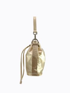 Luxe satin drawstring bucket bag with short detachable faux leather strap, plus additional long adjustable PL branded webbing strap. Silver hardware throughout plus hidden zipper pocket in lining.Bag Measures:Height: 20cmWidth: 19cmDepth: 9.5cmStrap Drop (short): 15cmStrap Drop (long/adjustable): 36-66cm Poppy Lissiman, Drawstring Bucket Bag, Belt Jewelry, Webbing Strap, Cosmetic Pouch, Waist Bag, Silver Hardware, Hidden Zipper, Leather Crossbody