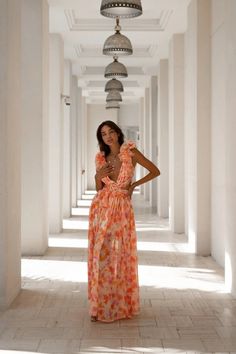 Exude elegance with the Clementine Floral Maxi Dress. Crafted from vibrant floral fabric, this show-stopping maxi cascades in delightful waves of color as bright as fresh-pressed clementines. Feature your figure with a cutout detail, then finish this masterpiece with a delicate lace-up detail along the back. A stunning best-seller in a bold new colour palette, this dress is sure to turn heads. • Zip at the back • Lined • Ties up at the back (tie may come attached or lose in the bag) • Maxi Dress Orange Floral Dress, Dress 16, Silk Skirt, Floral Maxi, Chiffon Fabric, Wedding Guest Outfit, Floral Fabric, Guest Dresses, Floral Maxi Dress