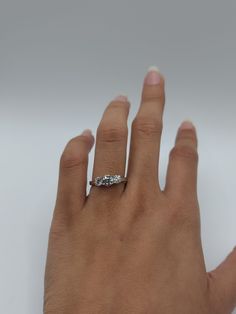 "This is a beautiful 3 stone Lab Grown diamond ring. It is set in real solid 14Kt Gold. You can choose if you want 14Kt White Gold, 14Kt Yellow Gold or 14Kt Rose Gold.  We have a lot of beautiful jewelry with natural diamonds. If any listing states \"diamond\" then it is a natural diamond. If the listing states \"Lab Grown\" it is a Lab Grown diamond. This is the perfect gift for mom, wife, fiancee, girlfriend, valentine, daughter, family or friend. It is a special gift for mother's day, valentine's day, wedding, anniversary, birthday, Christmas, Easter, New Year's and any holiday. Center diamond is 0.50 Ct and each side diamond is 0.25 Ct for a total of 1 Carats Total Ct Weight: 1 Carats Clarity: VS Color: FG Metal Weight: 2.80 Grams 2.25mm ring width 4.70mm Height  Comes in jewelry box M 1 Ct Diamond Ring, 3 Stone Diamond Ring, Tennis Jewelry, Sparkly Necklace, Stone Diamond Ring, Perfect Gift For Mom, Matching Necklaces, Stackable Rings, 14kt Gold