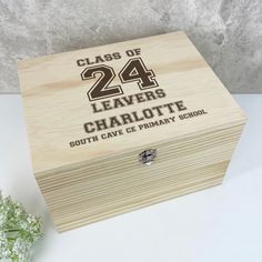 a wooden box with the words class of 24 leavers charlotte on it