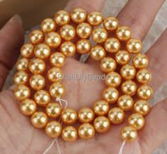 ON SALE  ♥ Item NO.:SH005    Material: shell pearl     Bead size : 8mm    Quantities: approx 48 pcs    Color:Deep gold    Length:15.5 inches    Note:have larger stock and can offer wholesale price.              If you need more quantity, please do not hesitate to contact me. ♥All of our products are taken with a camera at close range, so you can see their details more clearly. Some products may appear larger than the actual size. Please carefully check the size description in the list. The color of the product may be different due to different light, angle and background. The color of the product will also vary with the display. Note:have larger stock and can offer wholesale price. If you need more quantity, please do not hesitate to contact me. --------------------------------------- ♥ ♥ Gold Round Bead Pearl Necklace For Weddings, Gold Round Beads Pearl Necklace For Wedding, Gold Pearl Drop Necklace With Round Beads, Gold Pearl Necklace With Round Beads For Wedding, Gold Pearl Necklace With Round Gold Beads, Gold Pearl Jewelry With 8mm Beads, Wedding Pearls, Earring Wedding, Pearl Wedding