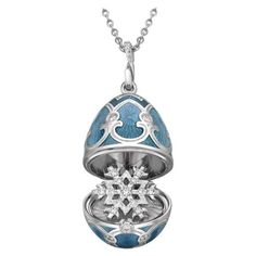 Fabergé Heritage White Gold Teal Guilloché Enamel Snowflake Surprise Locket. 18k white gold 45 round white diamonds 0.41cts (G VS+) 18k white gold chain 50cm egg size 22mm 1151FP1919 Snowflakes Jewelry, Rose Gold Emerald Ring, Faberge Jewelry, Snowflake Jewelry, Emerald Ring Gold, White Gold Chain, Historical Jewellery, White Gold Chains, Jewelry Charms