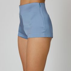 Introducing our Skye Silk Shorts, blending luxurious comfort with versatility. Expertly crafted from blue double silk satin, they feature a mid-waist and a sleek design, completed by a concealed side zip closure. Pair them with a breezy cover-up for a chic seaside look or dress them up under sheer dresses, for an elevated yet relaxed ensemble.  Match: Wear them under our Skye Silk Shirt Dress. Each Il Volo item is handmade by skilful artisans in our Bucharest atelier and it is created in limited series. 100% Italian Double Silk Satin.  Gentle dry clean. Do not wash. Do not use chlorine based bleach. Do not tumble dry. Cool iron, max 110 C.  Made in EU.