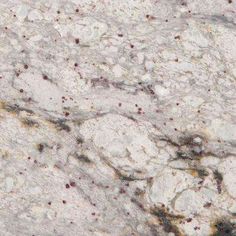 an image of white marble with brown spots