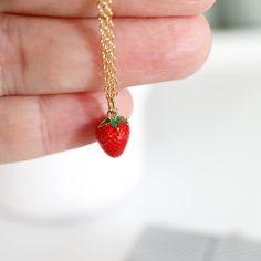 "Beautiful and cute little Strawberry charm necklace. Made of gold and enamel Strawberry with skinny gold plated skinny brass chain. Soft and warm. Great for gifts, everyday or special occasions.  Your item will ship in a gift box. Please feel free to contact me if you have any questions. ♥ Length  14\" - 20\"  ♥ Charm approx 3/8\"  ♥ Gold plated over brass / Enamel ♥ Silver color in here   www.etsy.com/listing/707121670  ♥  See more Rudiana Accessories  Rudiana.etsy.com" Everyday Cute Nickel-free Charm Necklaces, Cute Gold Charm Necklace For Birthday Gift, Cute Gold Charm Necklaces For Birthday Gift, Red Enamel Charm Necklaces For Gifts, Handmade Cute Charm Necklaces, Cute Charm Necklaces For Gifts, Cute Handmade Charm Necklaces For Birthday Gift, Cute Pendant Charm Necklace For Gift, Cute Handmade Everyday Charm Necklaces