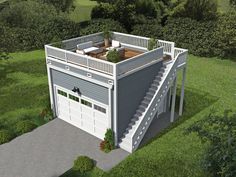 an aerial view of a garage with stairs leading up to the second floor and balcony