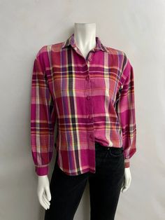 "Vintage 80's Pink, Plaid, Long Sleeve, Flannel by You Babes (S) This flannel comes in a magenta pink cotton with a plaid print  long sleeves with single wrist button closure with front button closure and collar. 100% Cotton Made in USA *This flannel is in excellent condition. Size: (S) Modern Day 4/6 (Tag Size: Small) Bust: 42\" Sleeve Length: 21 1/2\" (outside) 19\" (inside armpit to wrist) Length: 24 1/2\" Shoulder to Shoulder: (drop shoulder) Weight: 8 oz Follow Freshandswanky on Instagram" Pink Long Sleeve Flannel Shirt For Fall, Pink Cotton Flannel Long Sleeve Shirt, Pink Long Sleeve Cotton Flannel Shirt, Pink Cotton Long Sleeve Flannel Shirt, Pink Retro Shirt With Relaxed Fit, Casual Pink Cotton Flannel Shirt, Retro Pink Long Sleeve Shirt, Pink Vintage Long Sleeve Shirt, Retro Purple Cotton Shirt