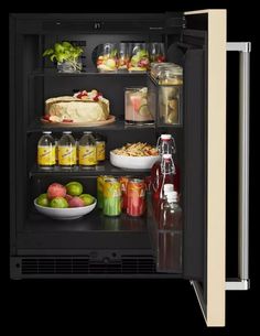 an open refrigerator filled with food and drinks