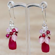 These lovely hand-crafted semi-precious stone dangle earrings feature natural hot pink faceted Chalcedony pyramid drops, adorned with pink Rose Quartz & Hot Pink Agate. They have been lovingly made with solid 925 sterling silver findings & earring posts. Metal: 925 Solid Sterling Silver Stone: Chalcedony, Rose Quartz & Agate Colour: Host Pink & pale Pink Design: Teardrop & Grapes Earrings Drop Length: 4.5cm Earrings Width: 0.8cm These earrings can also be made with 14k Gold filled findings, or I can customise a design specifically to meet your needs with your favourite semi-precious stones. Ask about a custom design to match a special outfit, for your wedding or bridesmaids, or for a special gift.  I love making beautiful, handmade one-of-a-kind pieces of jewellery using semi-precious natu Pink Gemstone Dangle Jewelry, Pink Gemstone Drop Earrings, Pink Briolette Earrings With Natural Stones, Pink Briolette Natural Stone Earrings, Pink Briolette Earrings For Gift, Pink Briolette Earrings As Gift, Nickel-free Pink Drop Jewelry, Pink Sterling Silver Briolette Earrings, Pink Dangle Jewelry With Faceted Beads