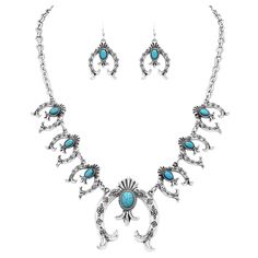 PRICES MAY VARY. Steal the show when you step out in this head turning Native American inspired squash blossom jewelry set! No western wardrobe would be complete without at least one statement piece of turquoise jewelry. The squash blossom is inspired by Navajo symbolism, spiritual in nature, the crescent moon (naja) was said to ward off bad spirits and is a prototypical symbol of most notably the Navajo tribe. Rolo necklace chain measures 18-21 inches in length with the 3 inch of adjustable ext Squash Blossom Jewelry, Navajo Tribe, Western Wardrobe, Western Bracelets, Bad Spirits, Blossom Jewelry, Easter Jewelry, Western Necklaces, Timeless Watches