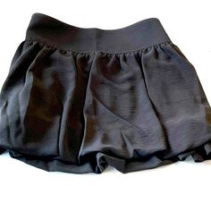 Nwt Black Aeropostale Mini Skirt Approximate Dimensions L 13” Waist 34” Great For A Casual Trendy Look Material Has No Stretch Fast Shipping Short Flowy Skirt With Built-in Shorts, Trendy Mini Skirt With Elastic Waistband, Flowy Skort With Built-in Shorts, Trendy Stretch Skirted Shorts, Trendy Skirted Stretch Shorts, Night Out Skirt With Elastic Waistband, Trendy Mini Bottoms With Elastic Waistband, Trendy Bottoms With Elastic Waistband And Mini Length, Relaxed Mini Skirt With Elastic Waistband