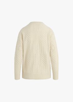 Inspired by a vintage stitch, there's nostalgia woven into the soft, wool-cashmere blend of The Jovie Sweater. With a relaxed fit, this ivory sweater is sure to be your cold weather companion. 74% Wool, 18% Nylon, 8% Cashmere Lameka is 5'9.5" wearing size small. Cozy Off White Winter Sweater, Cozy Off-white Winter Sweater, Cozy Winter White Merino Wool Sweater, Cozy Merino Wool Sweater In Winter White, Cozy Winter White Wool Sweater, Cream Wool Sweater For Fall, Cream Textured Cashmere Sweater, Winter White Cashmere Sweater For Winter, Winter White Cashmere Sweater