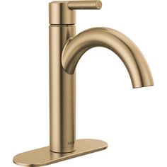 the modern faucet is shown in gold