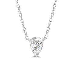 Add instant glamour to your daily wear with this pear solitaire necklace. The white gold pendant features a stylized three-prong basket securing pear-cut diamond that points downwards. This necklace delivers a subtle sparkle that can go from office to evening wear with ease. Timeless Pear-shaped White Gold Diamond Necklace, Classic Pear Shaped Solitaire Necklace With Prong Setting, Pear-shaped Diamond Necklace, Classic Solitaire Teardrop Pendant Necklace With Prong Setting, Classic White Diamond Pear-shaped Necklace, White Gold Necklace With Single Pear-shaped Diamond, Classic Pear-shaped Solitaire Necklace With Prong Setting, White Gold Pear-shaped Single Diamond Necklace, White Pear-shaped Diamond Solitaire Necklace