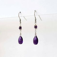 Purple Amethyst faceted flat briolette and micro faceted Purple Amethyst rondelles in sterling silver dangle earrings. Lovely and elegant jewelry made with top quality genuine gemstones in natural color with a lot of sparkle. The length of the dangle is about 1.5 inches and the earrings are lightweight and comfortable. Limited edition jewelry. Amethyst is the birthstone for the month of February. It is a powerful stone of spiritual protection and purification  Thank you for visiting my shop. Lov Purple Sterling Silver Teardrop Dangle Earrings, Teardrop Amethyst Jewelry With Faceted Detail, Faceted Teardrop Amethyst Jewelry, Teardrop Faceted Amethyst Jewelry, Elegant Amethyst Rondelle Jewelry, Elegant Faceted Briolette Crystal Earrings, Elegant Briolette Faceted Crystal Earrings, Elegant Briolette Crystal Earrings, Amethyst Gemstone Teardrop Dangle Earrings