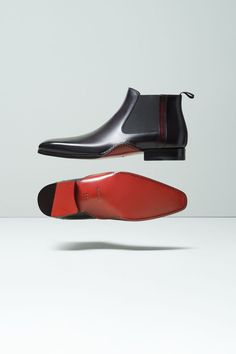 The Nadir is a contemporary Chelsea boot with tapered plain toe for a sleek and sophisticated appearance. It features our signature double Artesano leather sole, where the sole is wrapped onto the upper on both the inner and outer arch and hand-stitched by our master artisans for a distinctive look that is never replicated. Luxury Chelsea Boots With Leather Lining And Plain Toe, Formal Chelsea Boots With Rubber Sole And Calf Leather, Luxury Calf Leather Boots With Red Sole, Formal Chelsea Boots With Rubber Sole, Luxury Moc Toe Chelsea Boots With Leather Lining, Luxury Chelsea Boots With Leather Lining And Moc Toe, Modern Chelsea Boots With Leather Sole For Formal Wear, Business Leather Boots With Contrast Sole, Leather Shoes With Red Sole And Snip Toe