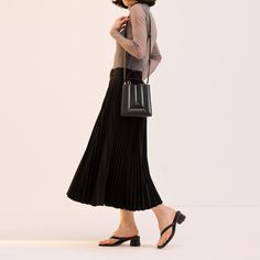 Sera Tall Tote Mini - Black Chic Black Evening Phone Bag, Versatile Evening Rectangular Phone Bag, Versatile Evening Phone Bag With Cell Phone Pocket, Modern Evening Bag With Card Slots, Versatile Rectangular Evening Phone Bag, Elegant Rectangular Phone Bag With Card Slots, Modern Evening Bags With Card Slots, Elegant Rectangular Phone Bag With Interior Card Slots, Elegant Evening Phone Bag With Cell Phone Pocket