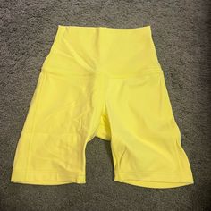 Never Worn! Yellow Sports Biker Shorts With Built-in Shorts, Yellow Athletic Shorts With Built-in Shorts For Workout, Yellow Stretch Go-dry Activewear, Yellow Stretch Activewear With Go-dry, Yellow Go-dry Activewear For Sports, Yellow Athletic Shorts With Built-in Shorts For Sports, Yellow Moisture-wicking Activewear For Workout, Yellow Sporty Athletic Shorts For Sports, Yellow Moisture-wicking Shorts