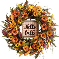 a wreath with the words hello fall written on it and sunflowers around it