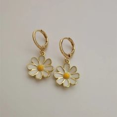 Delicate Flower Shaped Hoop Earrings, Delicate Flower-shaped Hoop Earrings, Spring Hoop Earrings With Flower Charm, Spring Hoop Earrings With Flower Charm As Gift, Spring Flower Charm Hoop Earrings As Gift, Spring Gift Hoop Earrings With Flower Charm, Trendy Metal Flower Earrings, Delicate Flower Charm Hoop Earrings, Trendy Metal Flower Shaped Earrings