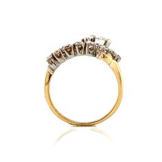 This Mid-Century Jabel heirloom cocktail ring features 1.025 total carats of diamonds in 14 karat yellow gold. One (1) Round Brilliant cut diamond is set in the center of the cluster. A swirling halo of fifteen (15) accent diamonds decorate the dynamic band. Finished in polished 14 karat yellow gold, this American-made diamond ring is expertly designed and full of life. 14k Gold Cluster Diamond Ring With Prong Setting, Yellow Gold Diamond Ring With Brilliant Cut Cluster, Cluster Yellow Gold Diamond Ring With Prong Setting, Yellow Gold Cluster Diamond Ring With Prong Setting, Fine Jewelry Yellow Gold Cluster Diamond Ring, Yellow Gold Diamond Ring With Cluster Accents, Dazzling Yellow Gold Cluster Ring With Prong Setting, Yellow Gold Cluster Ring With Brilliant And Baguette Cut, Yellow Gold Cluster Ring With Baguette And Brilliant Cut