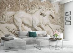 a living room with a large mural on the wall