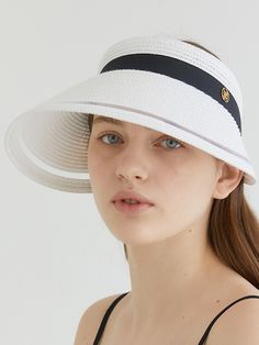 Editor's Notehalden is a brand that started with the minimalism and warm sensibility of Northern Europe.- Wide visor that can cover your face well- Brand logo pendant point- Size adjustable with ribbon around the hat- Daily point item Measurements (in.)- Head Girth: 21.26 in. ~ 23.62 in.- Depth: 1.77 in.- Visor: 4.92 in. Composition & Care- 100% Raffia- Do not wash or dry cleaning- Do not squeeze or iron- Wipe off moisture and stains with a dry cloth with little moistureDesigner- b Adjustable White Hat With Upf 50+, White Adjustable Hat With Upf 50+, Adjustable White Brimmed Sun Hat, Adjustable Brimmed White Sun Hat, White Visor For Spring Vacation, Adjustable White Hats With Uv Protection, Adjustable White Hat With Uv Protection, Adjustable Visor With Uv Protection, White Brimmed Sun Hat With Uv Protection