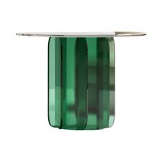 a green glass table with chrome top