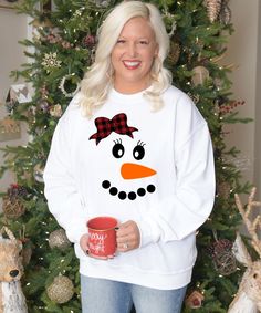 The Christmas season is almost here! Buffalo Plaid and Christmas go hand in hand. Born To Be Sassy offers this design in a variety of styles. Pair with jeans or leggings. Be the sassiest lady in this buffalo plaid snowman tee this Christmas! Fun White Winter Tops, Fun White Tops For Winter, Fun Winter Crew Neck T-shirt, Fun Winter T-shirt With Crew Neck, Fun Crew Neck T-shirt For Winter, Fun White Christmas Tops, Fun White T-shirt For Holiday, Playful Cotton Holiday Tops, Fun White Holiday Tops