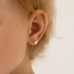 These finely crafted heart shaped earrings, are sure enough to brighten up your little girls day. A pair of 14k yellow gold screw back earrings that can fit securely in your little girls ears without causing discomfort. These beautiful heart earrings feature dainty clear cubic zirconia stones throughout one side to add more glimmering details. They are made of 14k yellow gold, a precious material which are suitable for little girls with sensitive ears. Gift box included. Age Group: Babies, Infan Earrings For Baby Girl, Toddler Earrings, Girls Day, Baby Earrings, Thread Earrings, Heart Shaped Earrings, Kids Necklace, Sell Gold