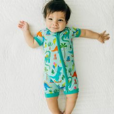 Child laying on a bed wearing a Prehistoric Party shorty zippy Prehistoric Party, Cute Dinosaurs, The Perfect Birthday, Cute Dinosaur, Cakes And More, Perfect Birthday, Birthday Outfit, Kids Wear, Dinosaurs