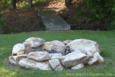 there is a fire pit made out of rocks